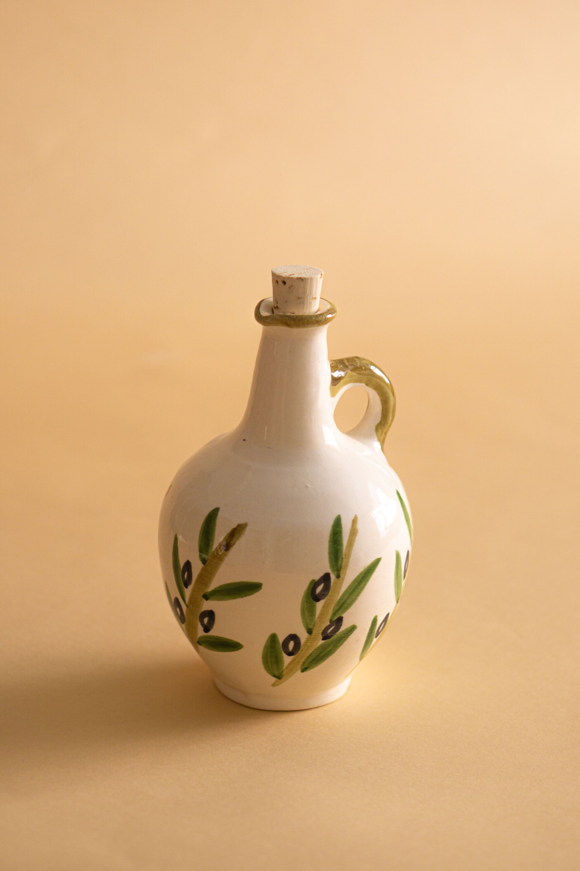 Olive oil dispenser in ceramic