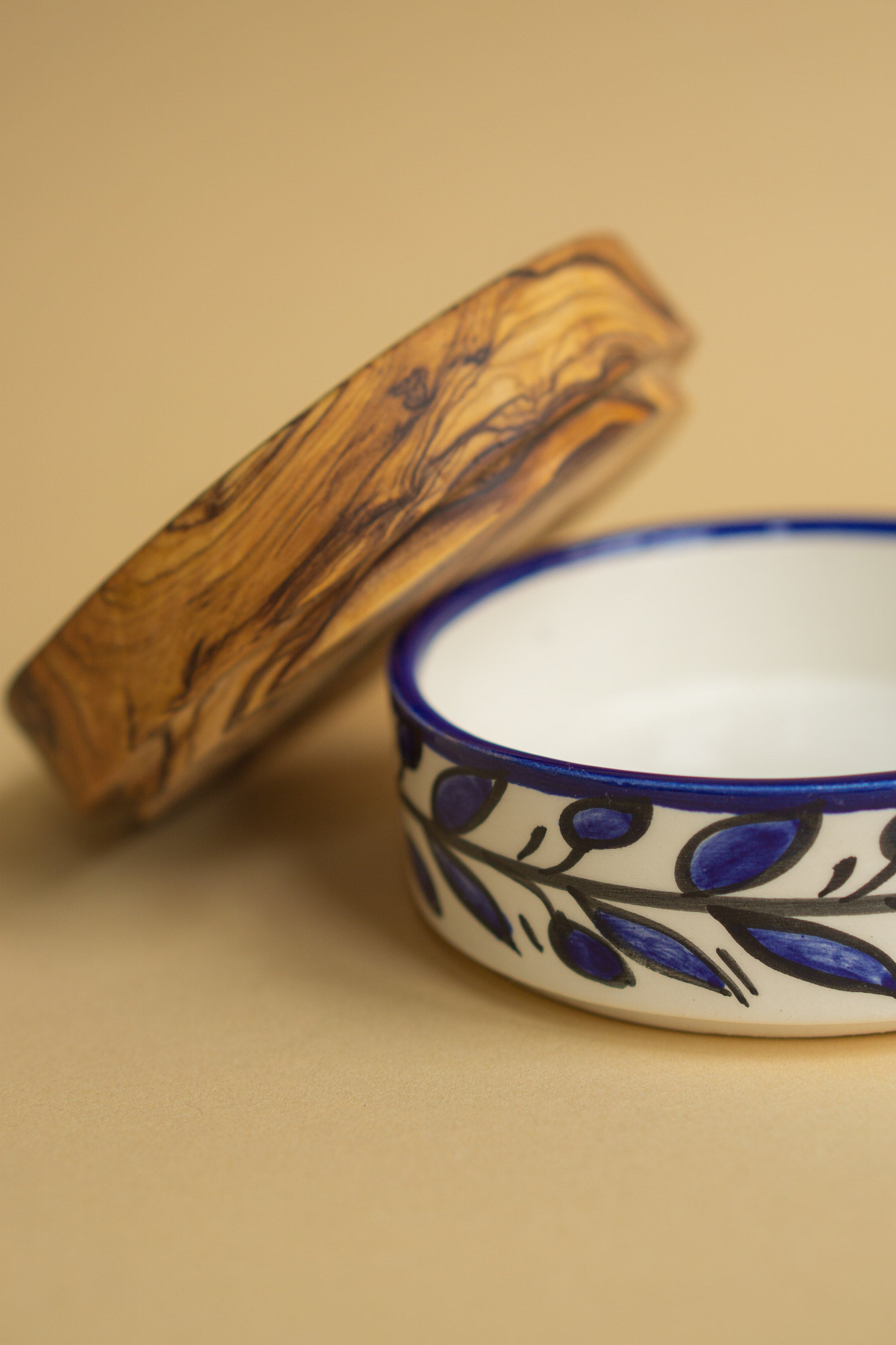 Hand painted serving bowl with olive wood